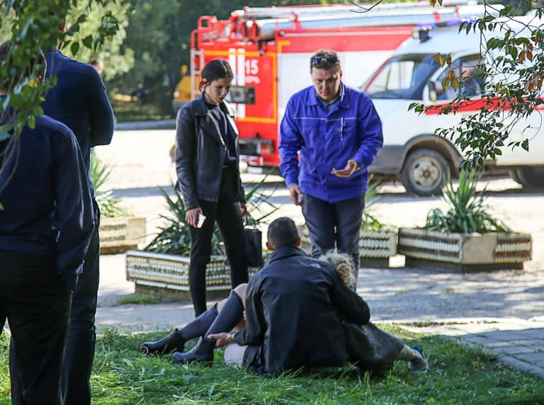 A rescuer aids an injured victim following Wednesday's attack