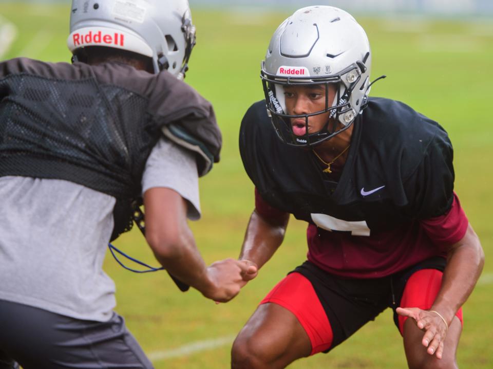 Bartram Trail High School’s Sharif Denson practices with a teammate at the school on Aug. 4, 2021.