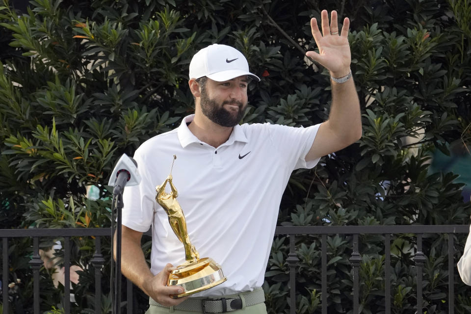 Scottie Scheffler celebrates after winning The Players Championship golf tournament Sunday, March 17, 2024, in Ponte Vedra Beach, Fla. (AP Photo/Lynne Sladky)