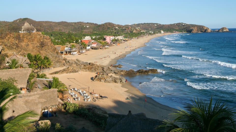 Zipolite Beach in Mexican is tolerant of nude sunbathing. - Shutterstock