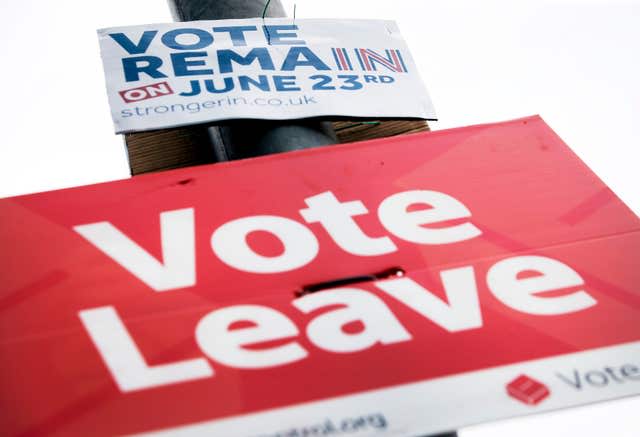 Vote Remain and Vote Leave signs on a lamp post in Leeds