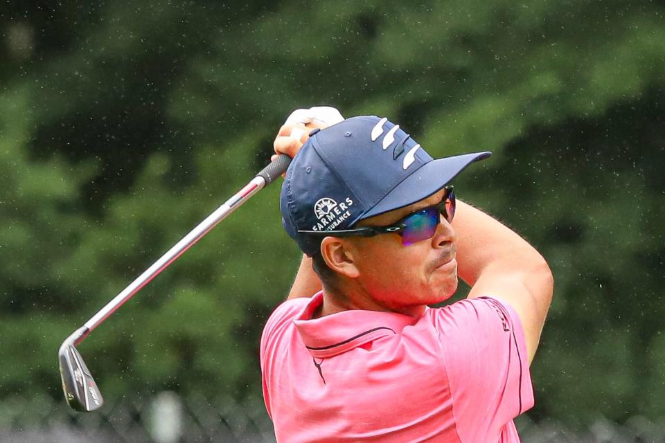 Rickie Fowler tees off on the 7th hole during the Rocket Mortgage Classic's Pro-Am at Detroit Golf Club on Wednesday, July 27, 2022.