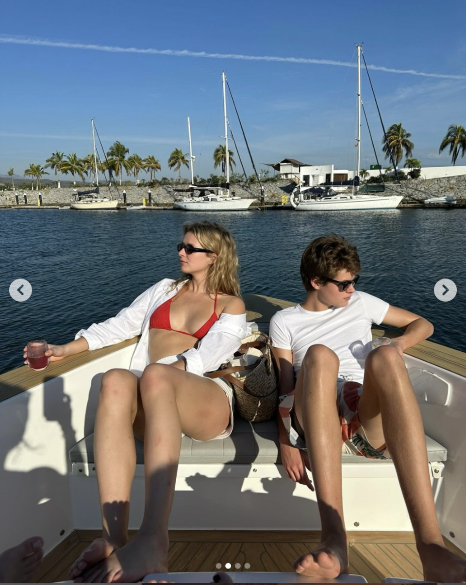 Apple and Moses Martin on a boat in Mexico