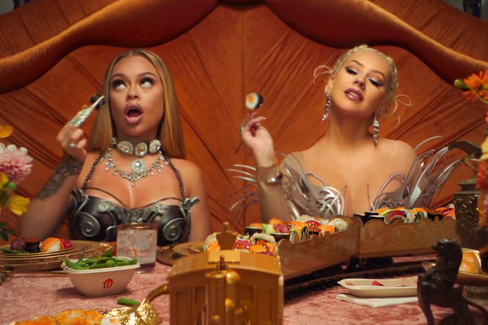 <p>Just Eat</p> Christina Aguilera and Latto Collaborate on Food Music Video Ad