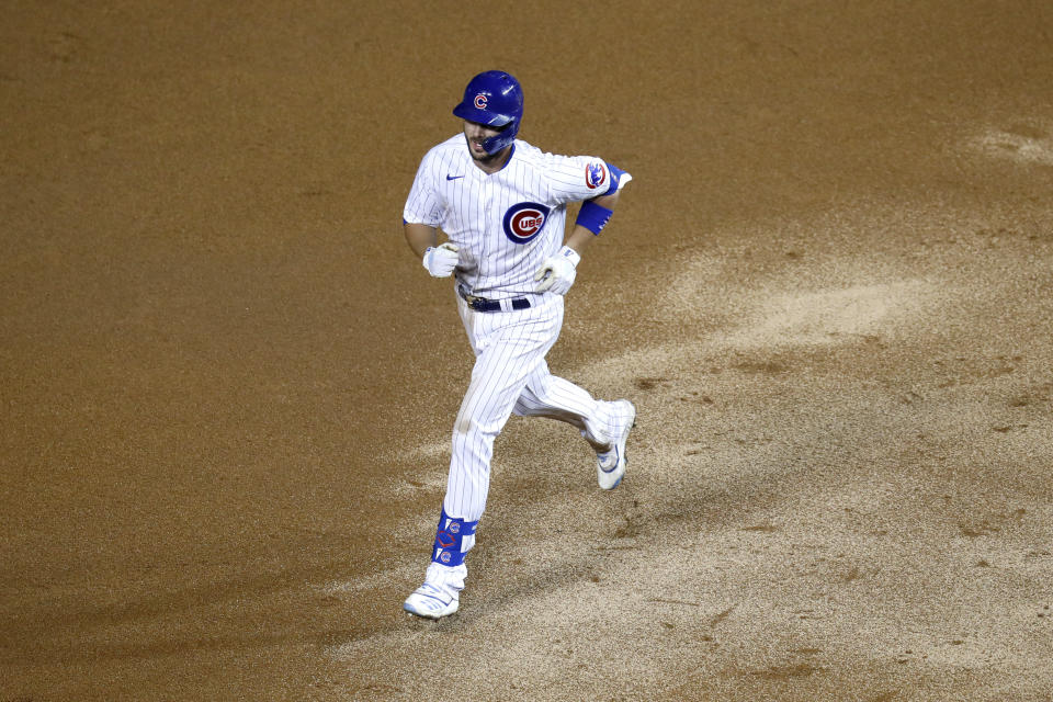 Chicago Cubs' Kris Bryant rounds the bases after hitting a home run during the seventh inning of a baseball game against the Kansas City Royals Monday, Aug. 3, 2020, in Chicago. (AP Photo/Charles Rex Arbogast)