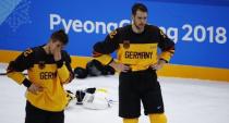 Ice Hockey - Pyeongchang 2018 Winter Olympics - Men's Final Game - Olympic Athletes from Russia v Germany - Gangneung Hockey Centre, Gangneung, South Korea - February 25, 2018 - Brooks Macek and Marcel Noebels of Germany react after their overtime loss. REUTERS/Brian Snyder