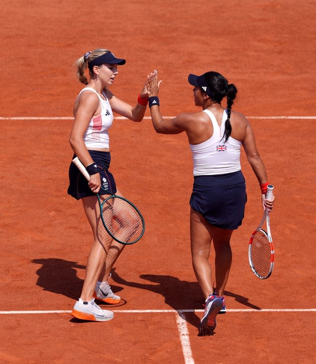 Katie Boulter, left, and Heather Watson high five