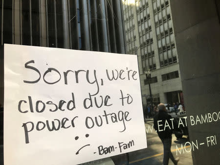 A sign on a restaurant informs customers that the facility is closed due to a power cut, in the financial district of San Francisco, California, U.S. April 21, 2017. REUTERS/Alexandria Sage