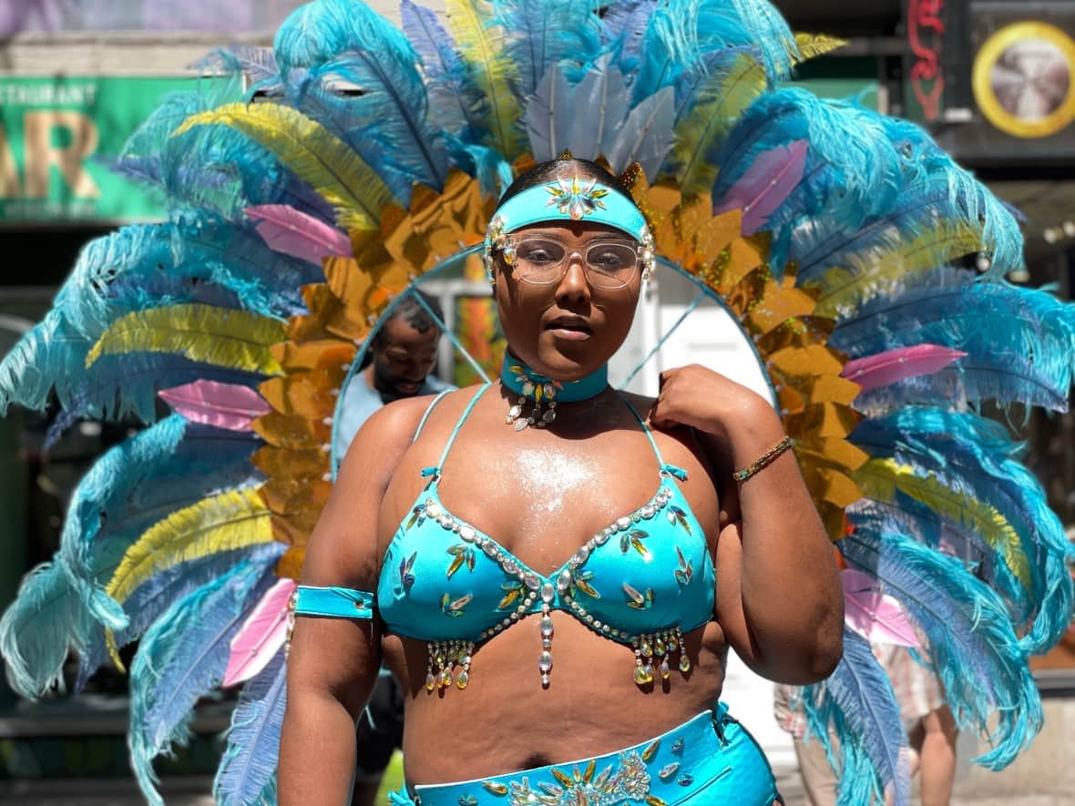 Bionce Oliver came out with Desire Carnival, one of the carnival bands attending the parade Saturday.  (Sarah Leavitt/CBC - image credit)