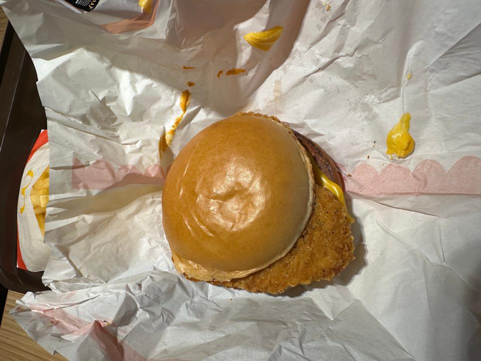 mcdonalds chicken paprika sandwich shiny bun with chicken patty on white paper packaging