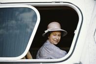 <p>Looking out a window during a royal trip to Acapulco, Mexico, she wears a purple ensemble.<br></p>