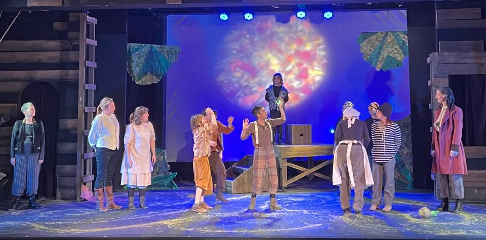 The cast of "Peter and the Stargazer" bid a poignant farewell on a dramatically lit stage at Cape Cod Theatre Company/Harwich Junior Theatre.
