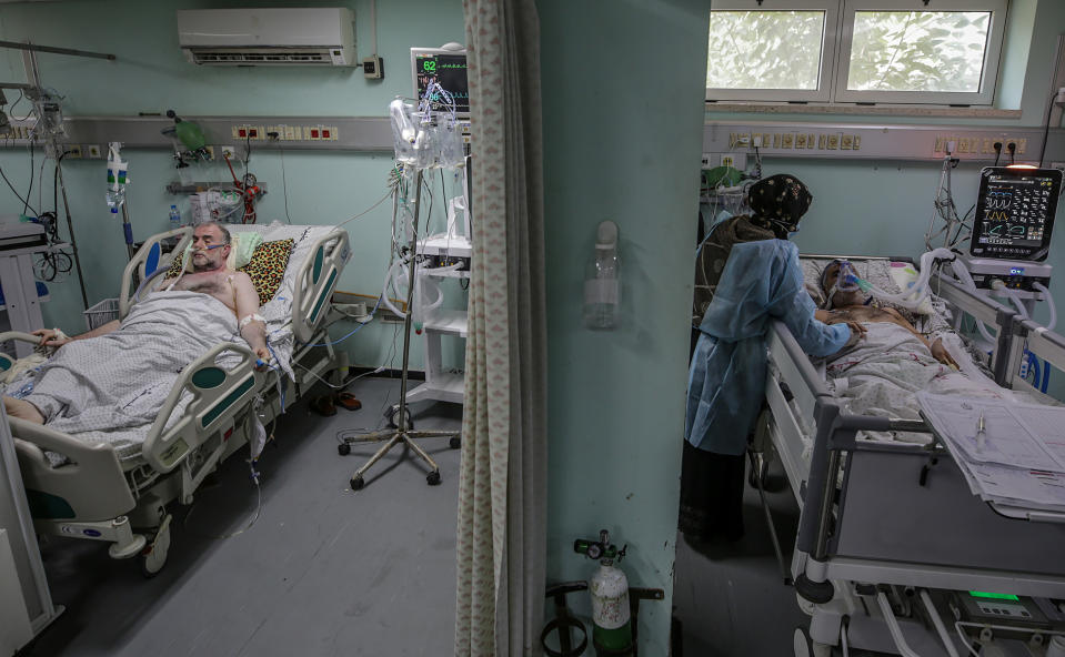 Palestinian patients with coronavirus in the intensive care unit at the European Hospital, east of Rafah town, southern Gaza strip, 30 November 2020. (Mohammed Saber/EPA-EFE/Shutterstock) 