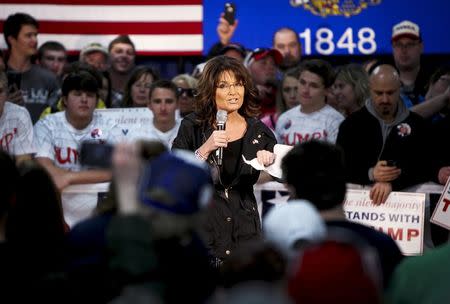 Former Alaska Governor Sarah Palin speaks to the crowd before U.S. Republican Presidential candidate Donald Trump takes the stage at a campaign town hall event in Wausau, Wisconsin April 2, 2016. REUTERS/Ben Brewer