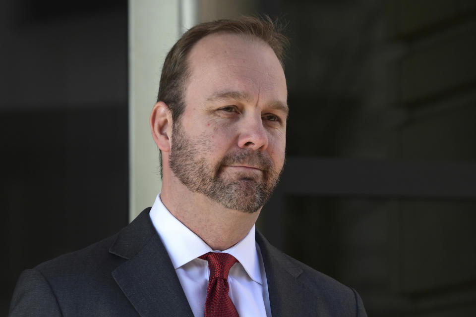 FILE - In this Dec. 11, 2017, file photo, Rick Gates, departs federal court in Washington. House intelligence committee has issued subpoenas for former national security adviser Michael Flynn and Rick Gates, a former Trump campaign aide. (AP Photo/Susan Walsh, File)