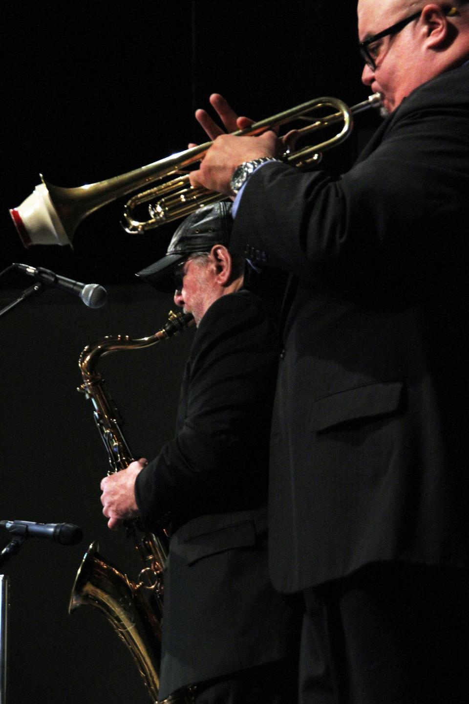 Horn players Dan Miller (right) and Lew Del Gatto