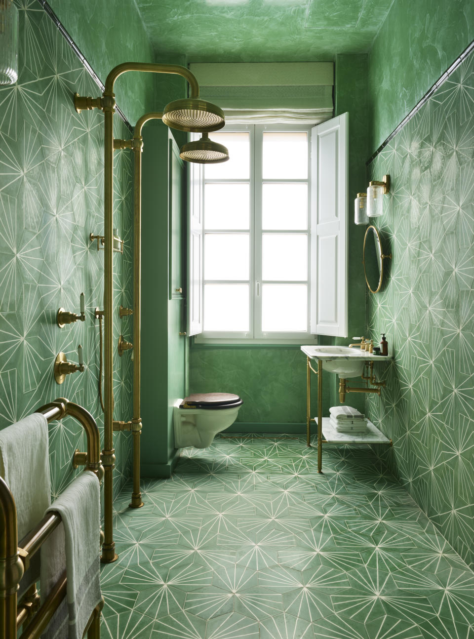 Go for all-over color with shower tiles