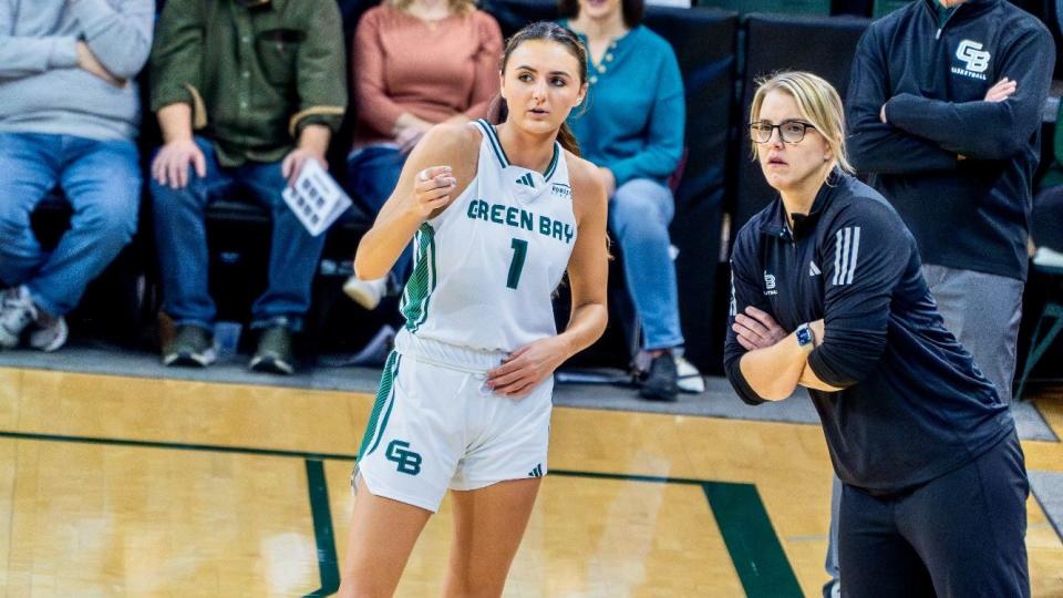 UWGB associate head coach Megan Vogel, right, has been hired as an assistant with the Phoenix Mercury.