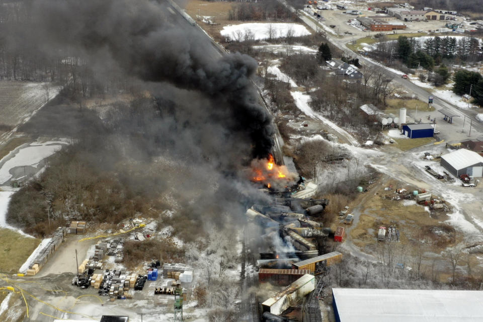 FILE - This image taken with a drone shows portions of a Norfolk Southern freight train Saturday, Feb. 4, 2023, that still burns after it derailed the night before in East Palestine, Ohio. Norfolk Southern alone will be responsible for paying for the cleanup after last year's fiery train derailment in eastern Ohio, a federal judge ruled, Wednesday, March 6, 2024. (AP Photo/Gene J. Puskar, File)