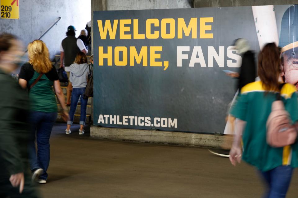 A sign welcomes fans at Oakland Coliseum.