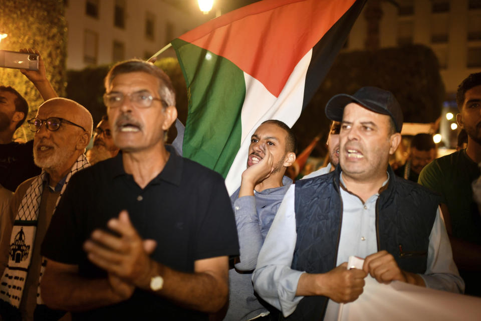 Hundreds of Moroccans take part in a protest in solidarity with Palestinians in Gaza following the bombing of AlAhli hospital, in Rabat, Morocco, Tuesday, Oct. 17, 2023. (AP Photo)