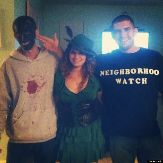 A group costume<a href="http://www.huffingtonpost.com/2013/10/28/trayvon-zimmerman-halloween-costume_n_4170528.html" target="_blank"> features a man dressed as Martin</a>, wearing blackface and a blood-stained hoodie, and a man portraying Zimmerman, wearing a shirt that reads "Neighborhood Watch." In a photo uploaded to the Facebook account of Caitlin Cimeno, the woman in the picture, the man portraying Zimmerman has fashioned a gun out of his right hand and has pointed it at the man dressed as Martin.