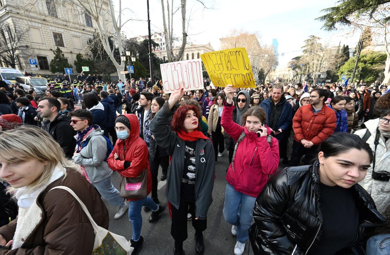 Georgians protest a foreign agent bill that mirrored a Russian law used to crack down on dissent. <a href="https://www.gettyimages.com/detail/news-photo/people-take-part-in-a-demonstration-outside-georgias-news-photo/1247903655" rel="nofollow noopener" target="_blank" data-ylk="slk:Vano Shlamov/AFP via Getty Images;elm:context_link;itc:0;sec:content-canvas" class="link ">Vano Shlamov/AFP via Getty Images</a>