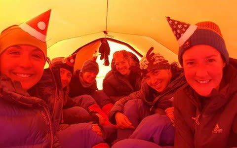 The women celebrating Christmas during their expedition