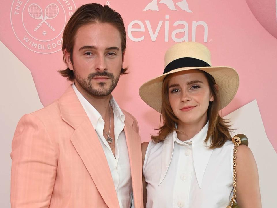 <p>Dave Benett/Getty</p> Alex Watson and Emma Watson in the evian VIP Suite on day fourteen of Wimbledon 2023.
