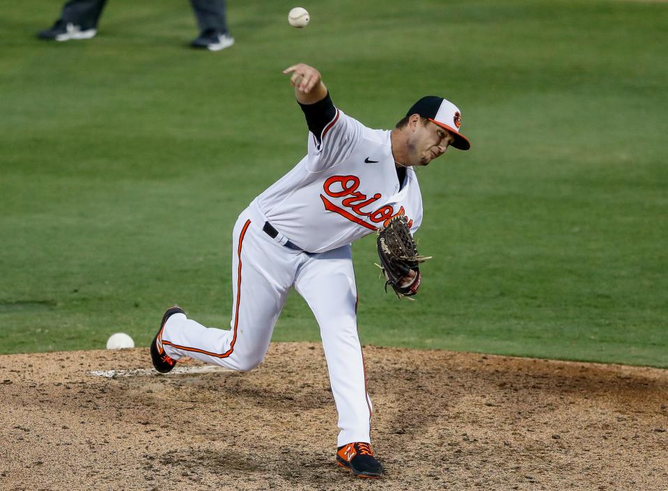 Mar 20, 2021; Sarasota, Florida, USA;  Baltimore Orioles relief pitcher Mac Sceroler (67) pitches in the sixth inning during spring training at Ed Smith Stadium. Mandatory Credit: Nathan Ray Seebeck-USA TODAY Sports