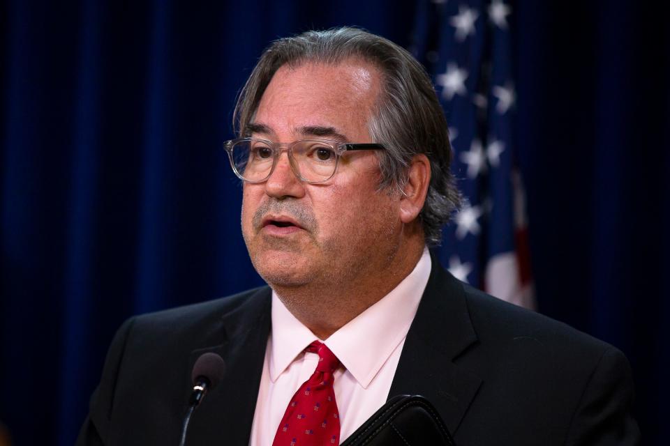 Tom Liddy with the Maricopa County Attorney's Office speaks during a press conference regarding the approval of a national opioid settlement, in Phoenix on Oct. 20, 2021.