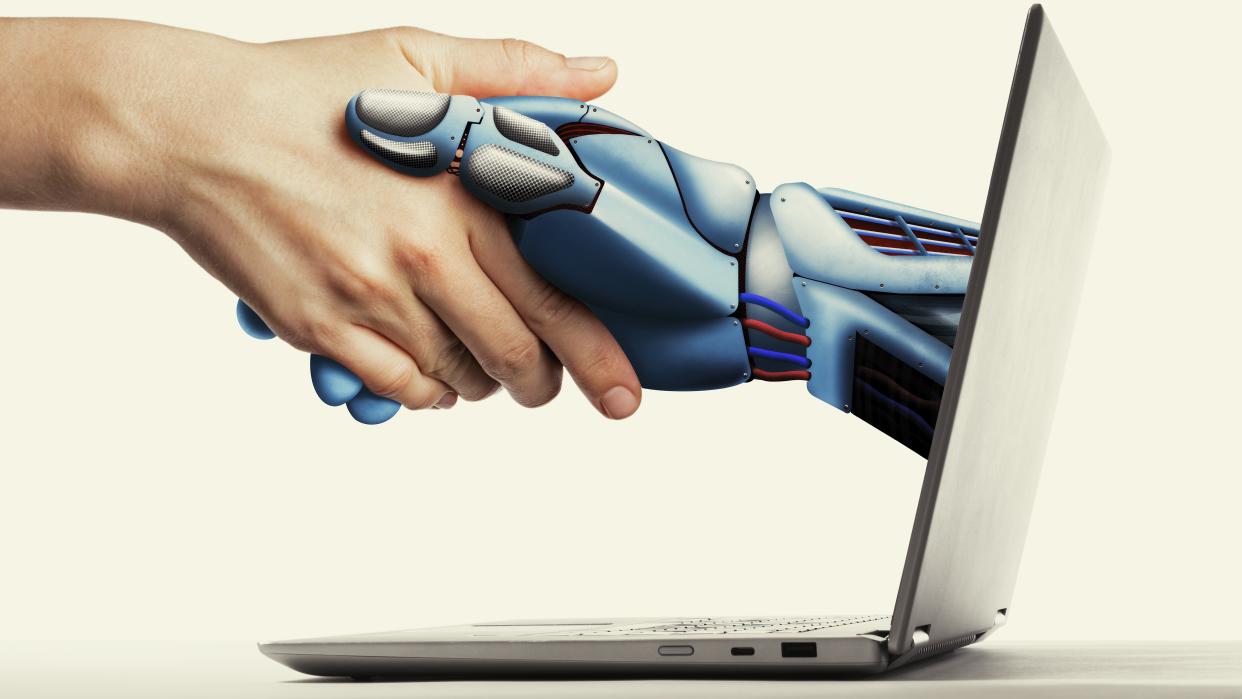  art of a human hand with artificial intelligence via laptop 