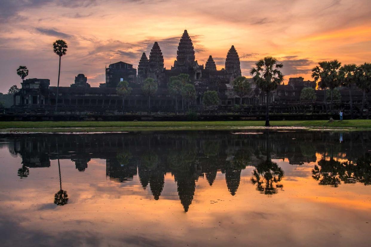 Angkor Wat built by Suryavarman II this place is the largest temple religious monument in the world.