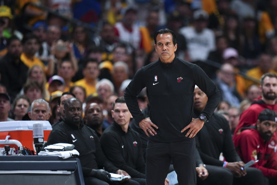 Miami Heat coach Erik Spoelstra watches during the first half of Game 1 of the basketball team's NBA Finals against the Denver Nuggets, Thursday, June 1, 2023, in Denver. (AP Photo/Jack Dempsey)