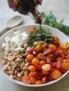 <p>Tomatoes and mozzarella pair well with most things, including hearty white beans, basil, and balsamic.</p> <p>Get the recipe <a href="https://inquiringchef.com/caprese-white-bean-salad/" rel="nofollow noopener" target="_blank" data-ylk="slk:here" class="link ">here</a>.</p>
