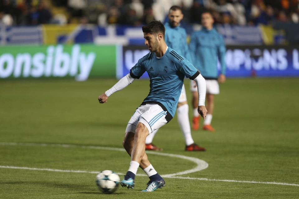 Real Madrid’s Marco Asensio kicks the ball before the Champions League Group H soccer match between APOEL Nicosia and Real Madrid at GSP stadium, in Nicosia, on Tuesday, Nov. 21, 2017. (AP Photo/Petros Karadjias)