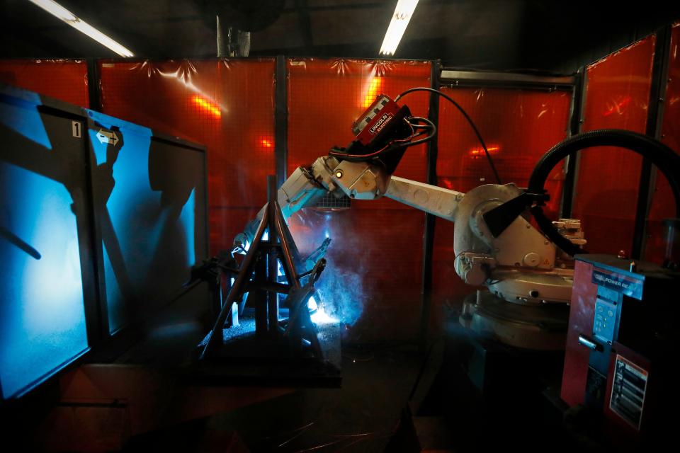 A robot welds some of the boat stands at the Brownell Boat Stands manufacturing plant in the Mattapoisett industrial park.