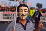 Protesters marched in the north Spain town of Santander- home of the banking group.