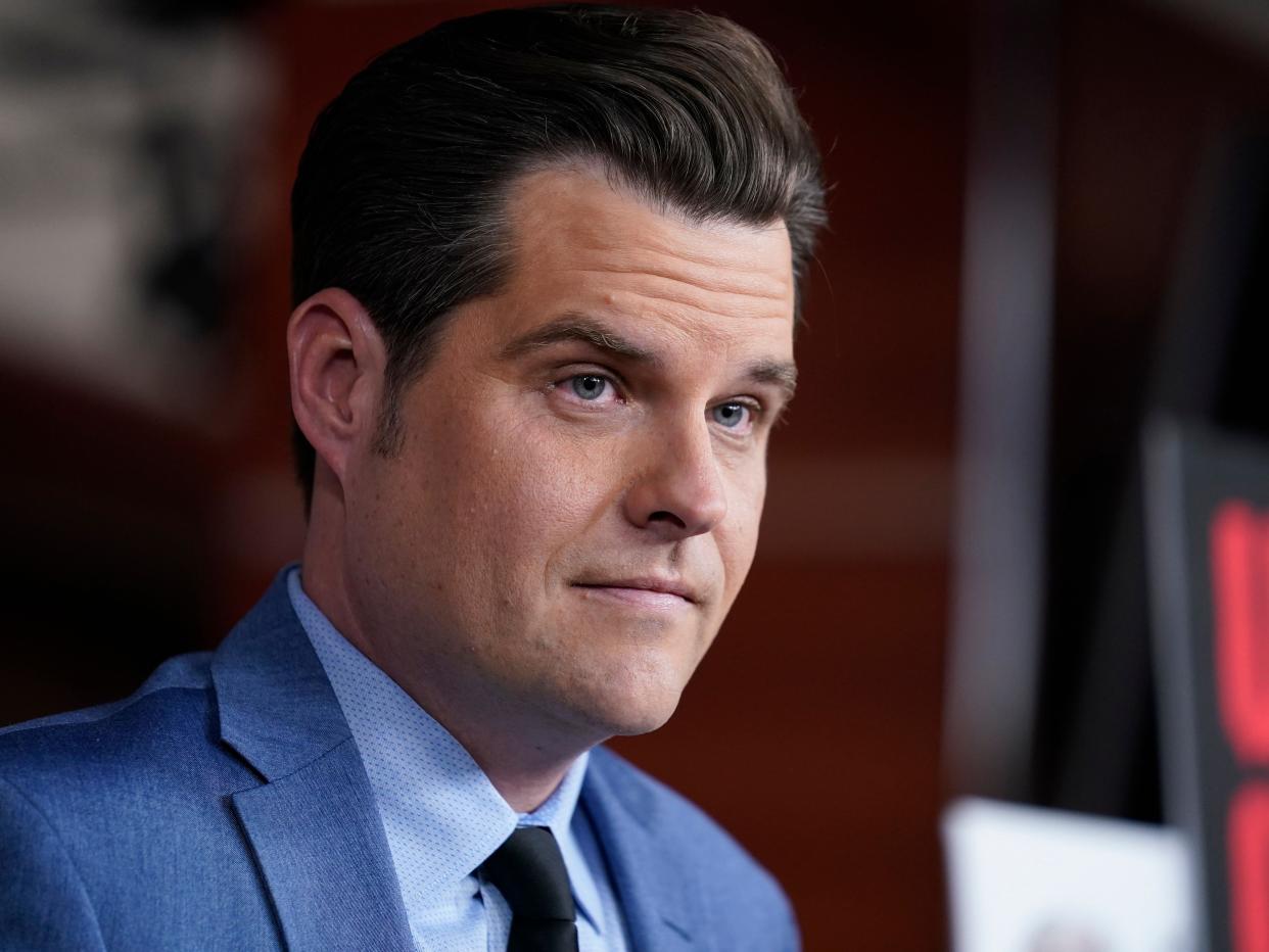 Rep. Matt Gaetz, R-Fla., listens during a news conference at the Capitol in Washington, Tuesday, Dec. 7, 2021. 