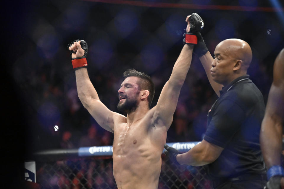 Mateusz Gamrot reacts after being declared the winner over Jalin Turner with a split decision in a UFC 285 mixed martial arts lightweight bout Saturday, March 4, 2023, in Las Vegas. (AP Photo/David Becker)