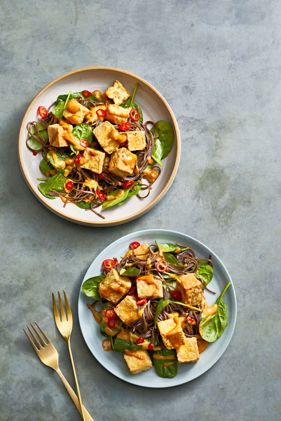 peanut sauce soba with crispy tofu on a plate