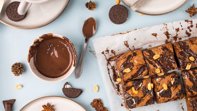 Oreo cookies, melted chocolate, and homemade brownies