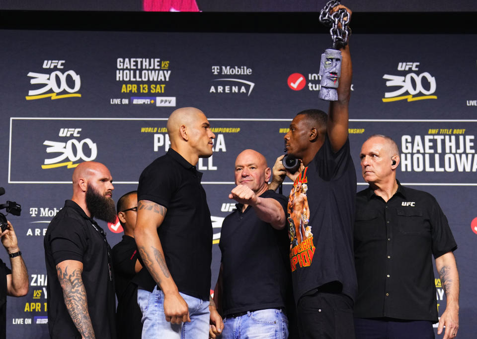 LAS VEGAS, NEVADA – APRIL 11: (L-R) Opponents Alex Pereira of Brazil and Jamahal Hill face off during the UFC 300 press conference at MGM Grand Garden Arena on April 11, 2024 in Las Vegas, Nevada.  (Photo by Chris Unger/Zuffa LLC via Getty Images)