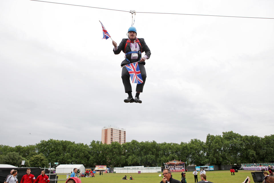 Mayor of London Boris Johnson gets stuck on a zip-line during BT London Live in Victoria Park on August 01, 2012 in London, England.  Mr. Johnson was a guest at a BT London Live event at the East London park, where visitors can watch the 2012 Olympic Games action on a big screen or try their hand at a range of Olympic sports. Earlier this week a poll of Conservative voters suggested the mayor was their top choice to succeed David Cameron as Prime Minister. (Photo by Kois Miah/Getty Images)