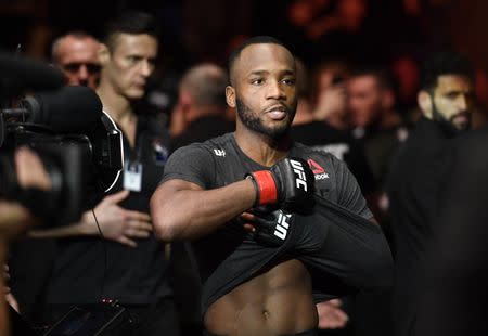 Mar 16, 2019; London, UK; Leon Edwards (red gloves) before his fight against Gunnar Nelson (blue gloves) during UFC Fight Night at O2 Arena. Mandatory Credit: Steve Flynn-USA TODAY Sports