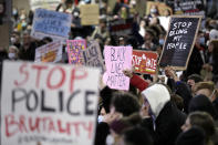 Protesters gather in Sydney, Tuesday, June 2, 2020, to support the cause of U.S. protests over the death of George Floyd and urged their own governments to address racism and police violence. Floyd died last week after he was pinned to the pavement by a white police officer who put his knee on the handcuffed black man's neck until he stopped breathing. (AP Photo/Rick Rycroft)