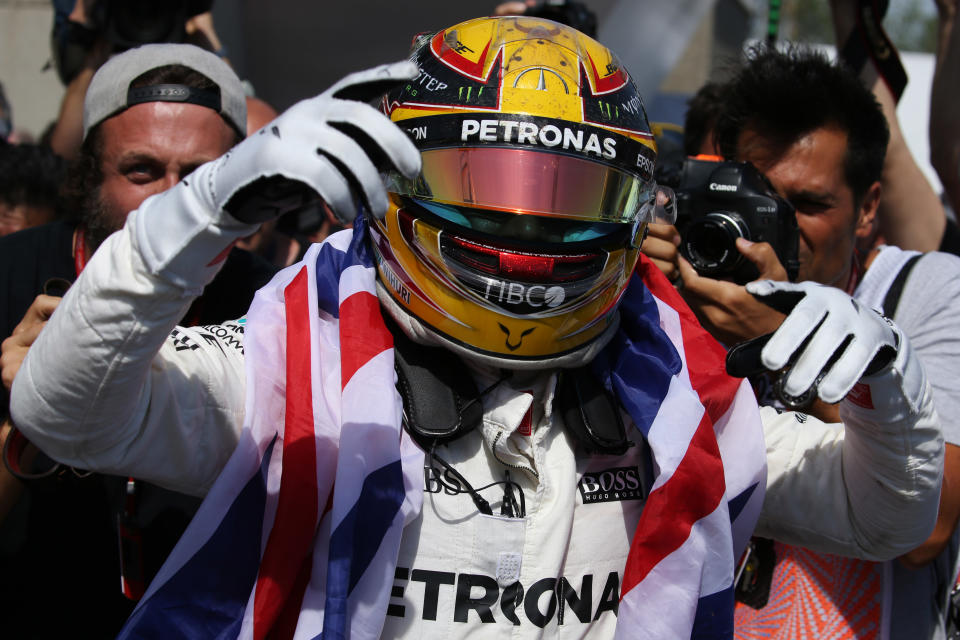 Untouchable: Lewis Hamilton after his 2017 Canadian Grand Prix victory, wearing the helmet gifted to him by Ayrton Senna’s family to mark Hamilton equalling the Brazilian’s 65 pole positions