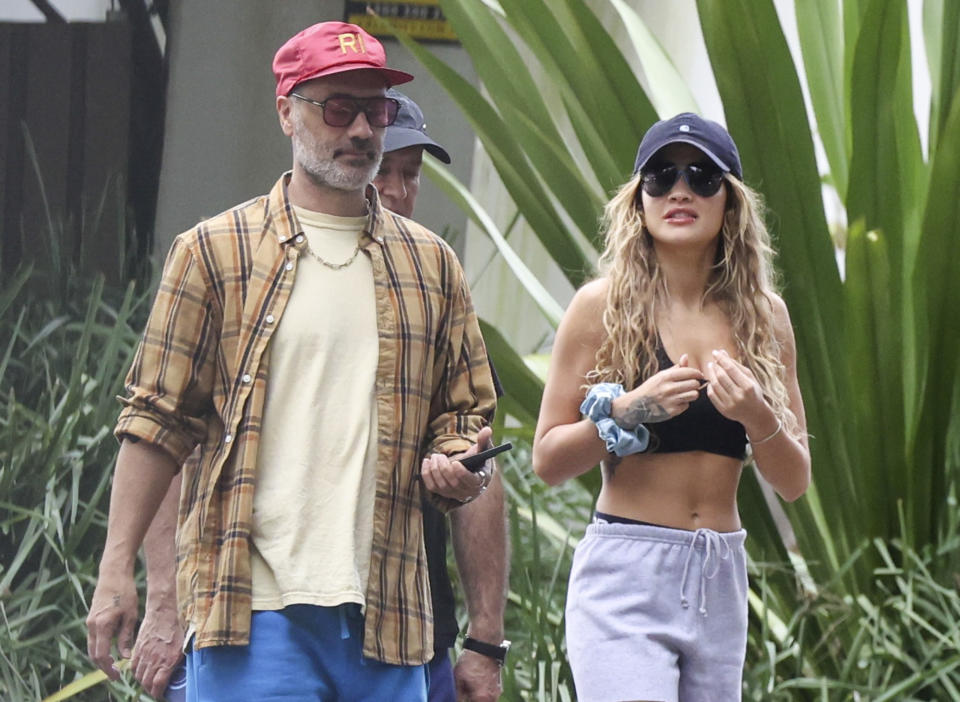 <p>Heading out for a coffee run in Sydney, Australia, <a href="https://people.com/tag/rita-ora/" rel="nofollow noopener" target="_blank" data-ylk="slk:Rita Ora;elm:context_link;itc:0;sec:content-canvas" class="link ">Rita Ora</a> is joined by her husband, Taika Waititi, and her dad, Besnik.</p>