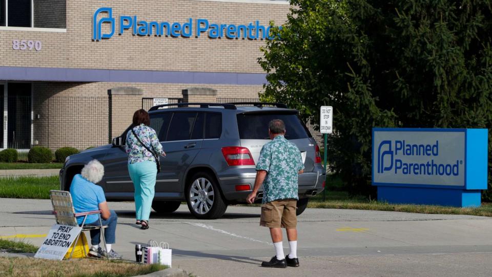 PHOTO: In this Aug. 16, 2019, file photo, abortion protesters attempt to hand out literature at a Planned Parenthood clinic in Indianapolis. (Michael Conroy/AP, FILE)