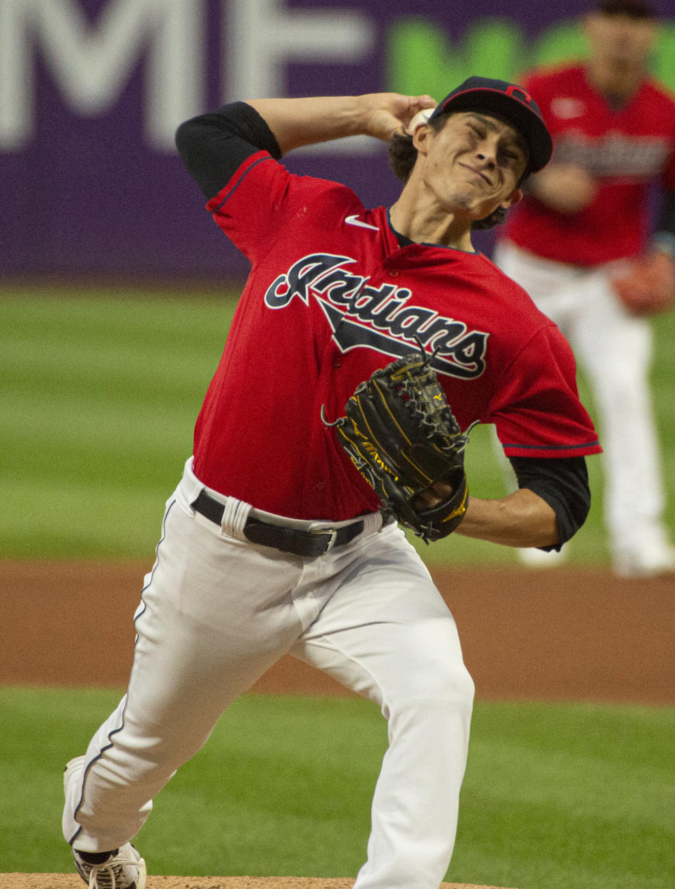 Cleveland Indians starting pitcher Eli Morgan delivers against the Chicago White Sox during the first inning of a baseball game in Cleveland, Saturday, Sept. 25, 2021. (AP Photo/Phil Long)